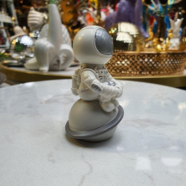 Mini Astronauta Sentado