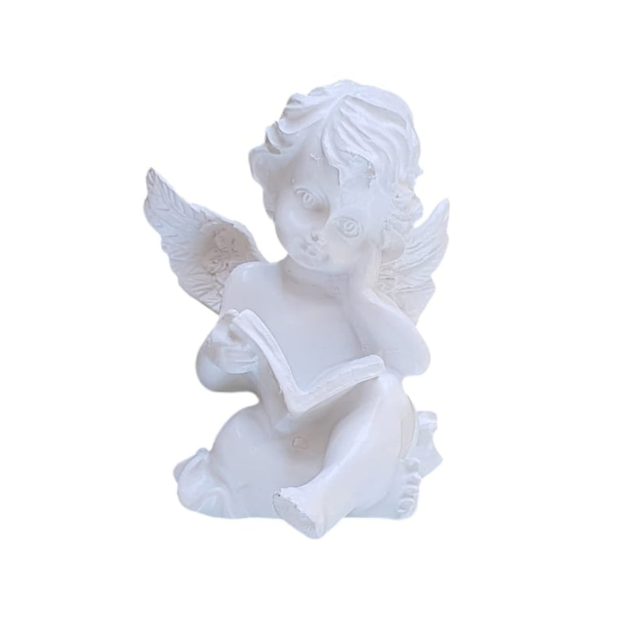 Ángel sentado Leyendo