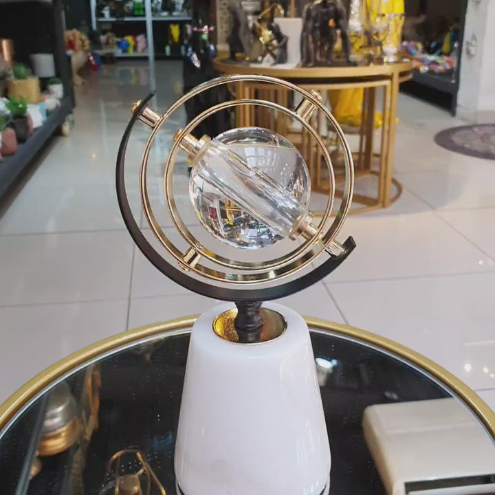 Esfera con base de marmol