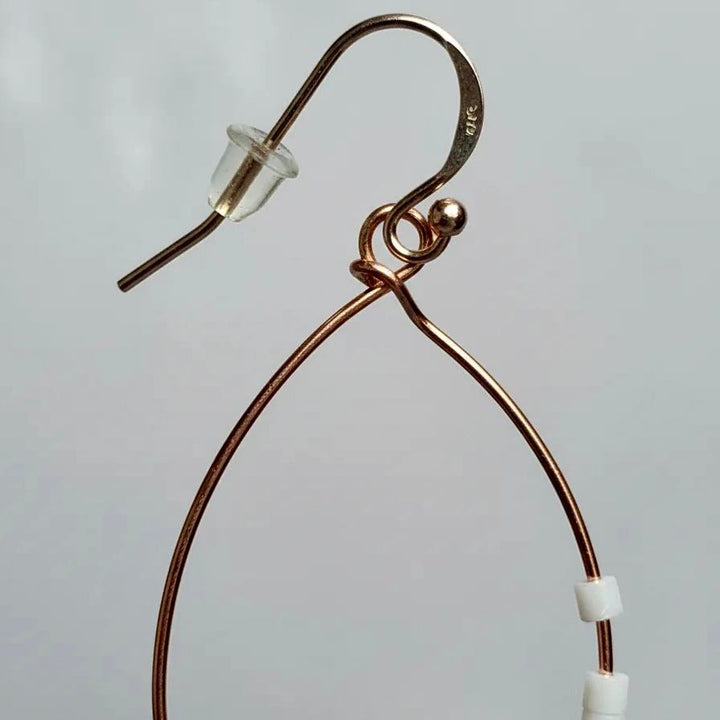 Aros Dalia color rosado con blanco