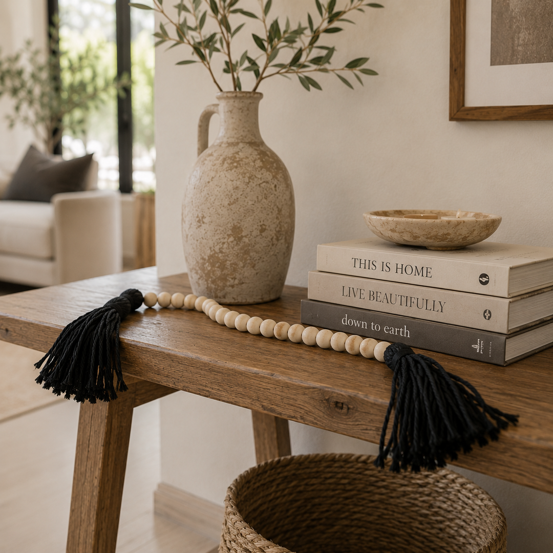 Adorno Borla beige flecos negros