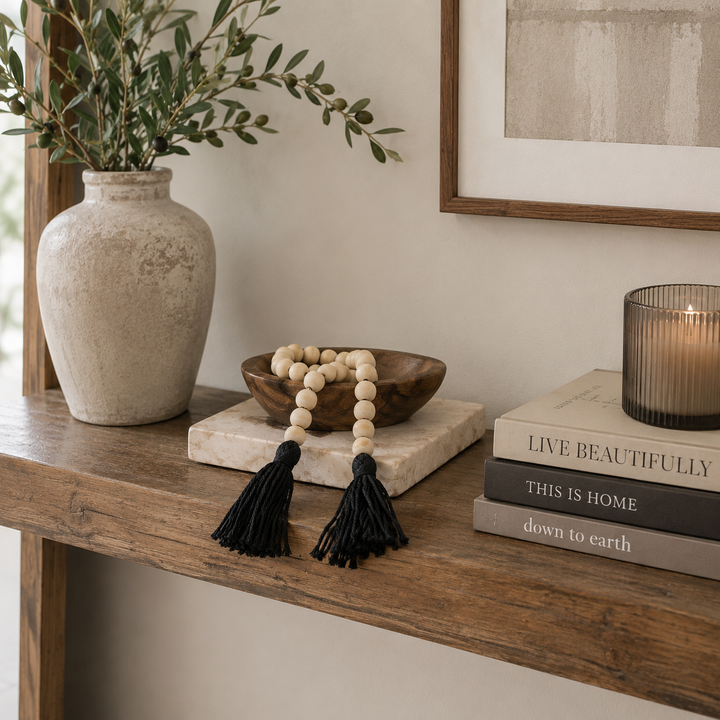 Adorno Borla beige flecos negros