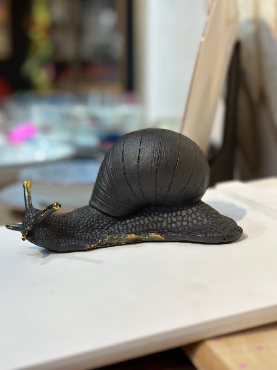 Caracol Negro con Dorado