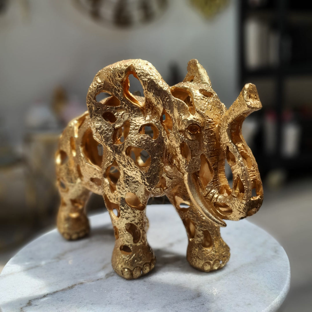 Elefante color dorado M