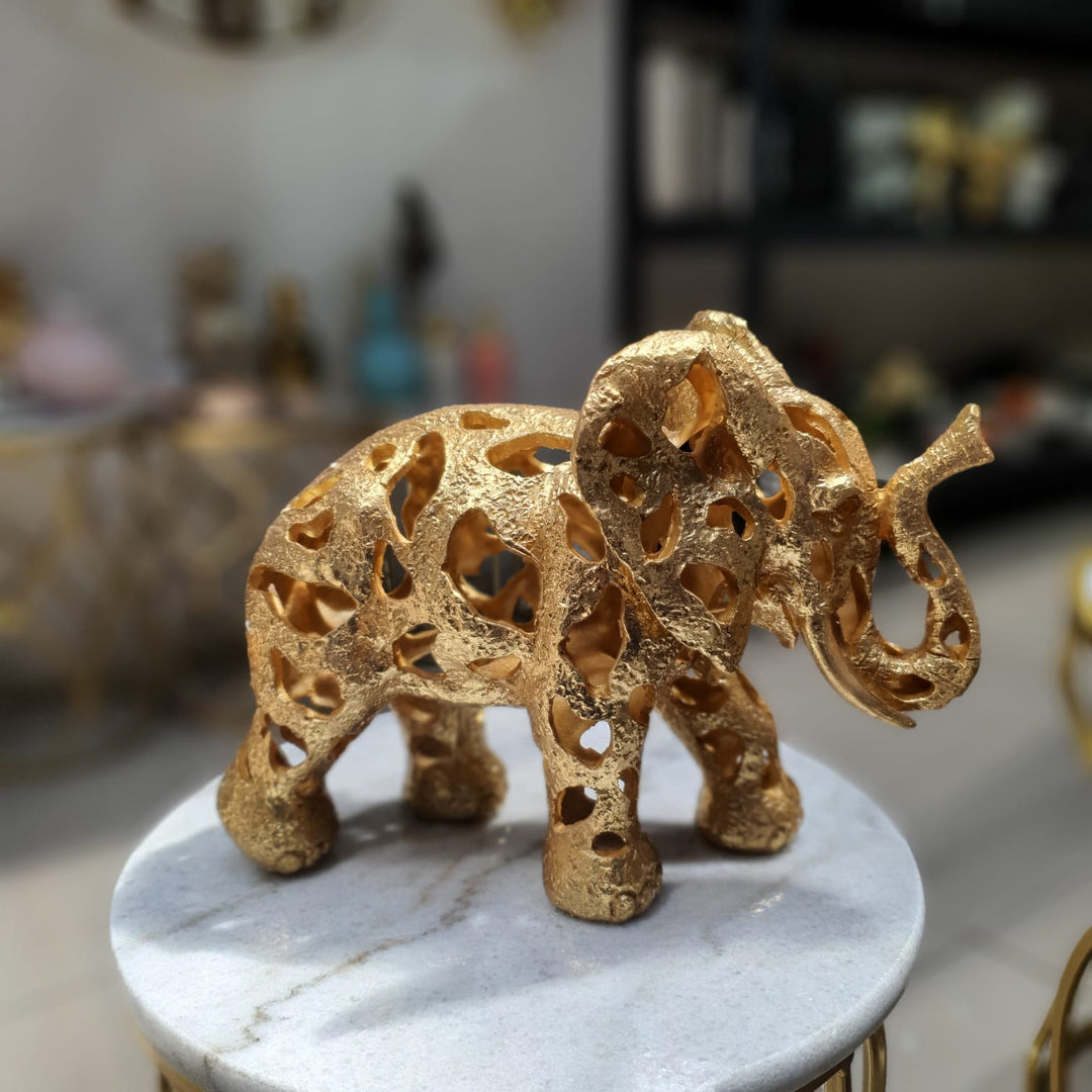 Elefante color dorado M