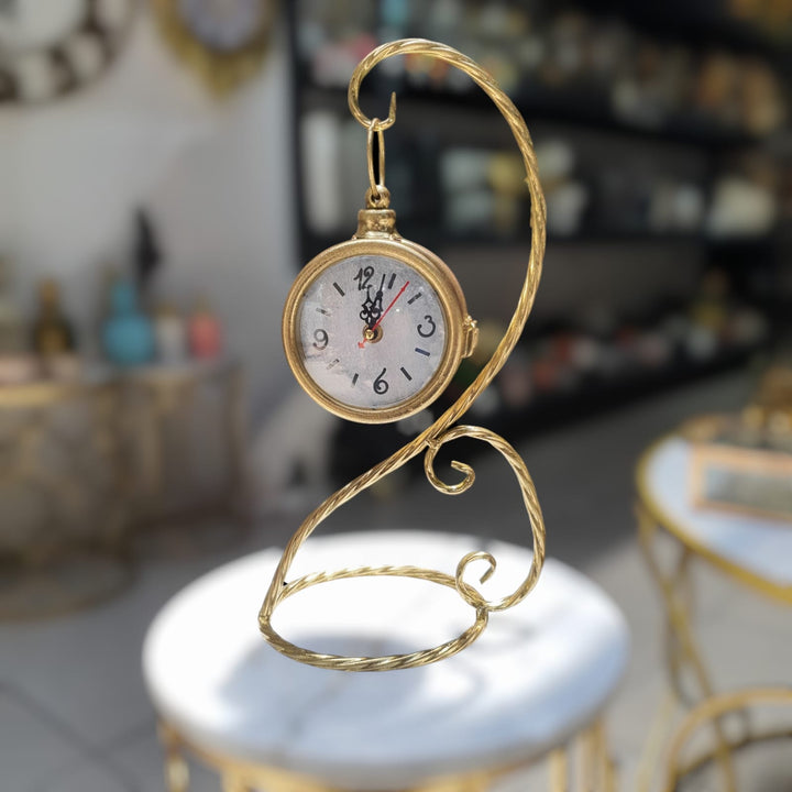 Reloj de mesa color dorado