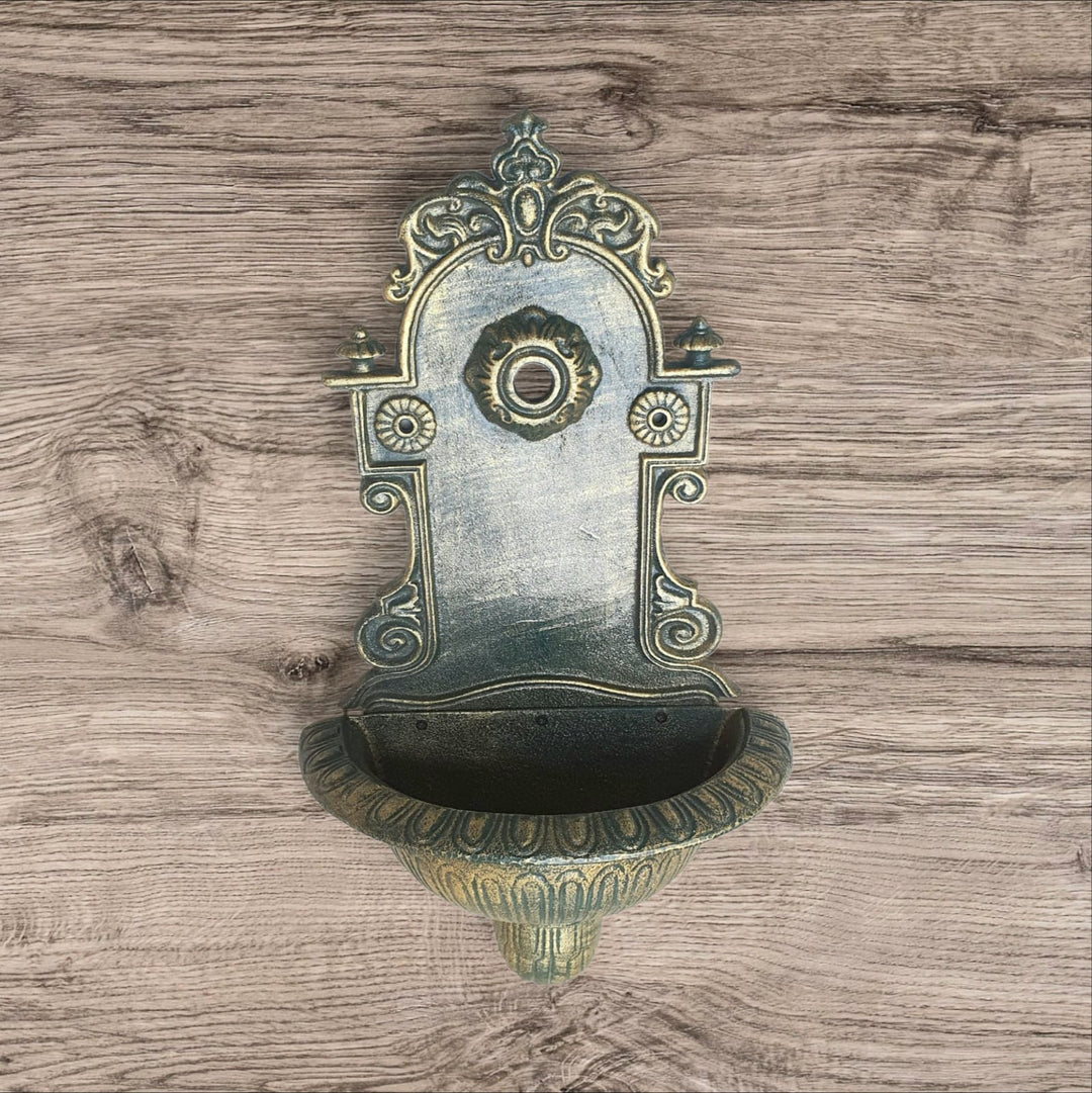 Fuente de hierro para pared