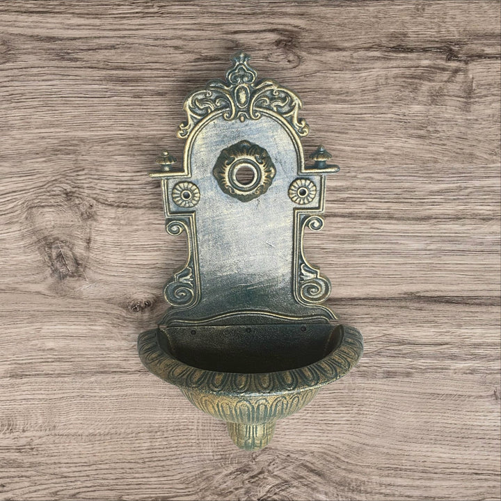 Fuente de hierro para pared
