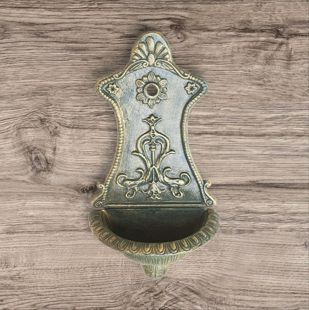 Fuente de hierro para pared diseños