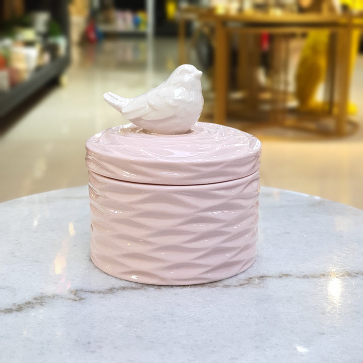 Contenedor de pajarito color rosado