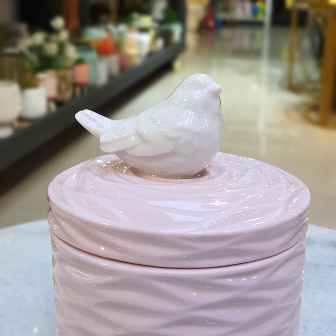 Contenedor de pajarito color rosado