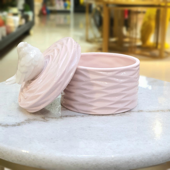 Contenedor de pajarito color rosado