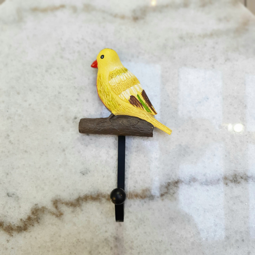 Percha pajarito color amarillo