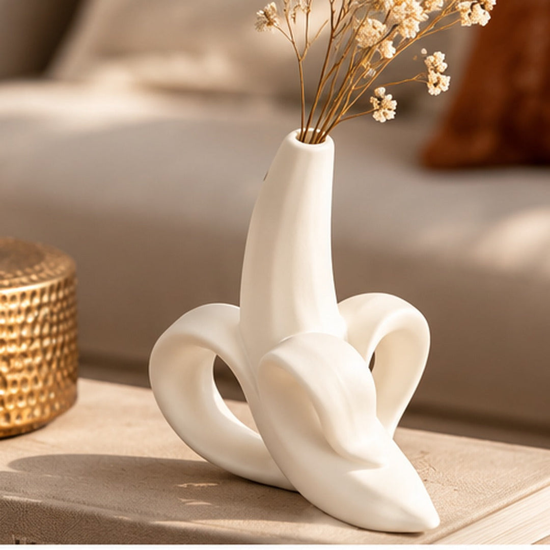 Figura decorativa banana blanca libros