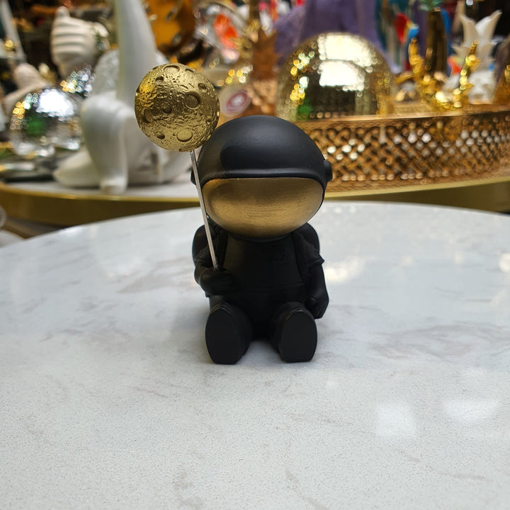 Astronauta Sentado Negro con dorado CASONA DECO