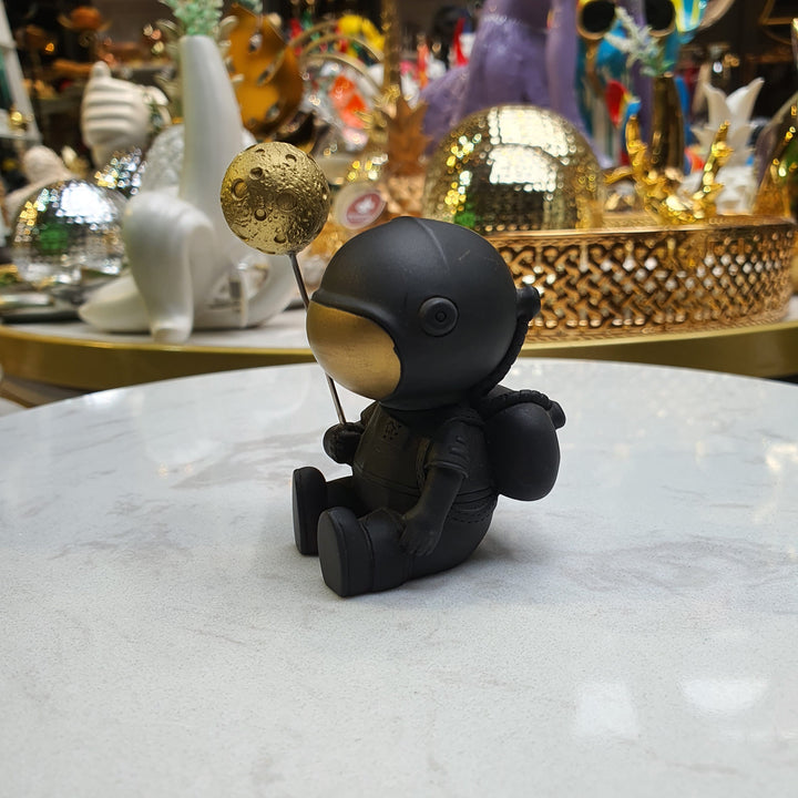 Astronauta Sentado Negro con dorado CASONA DECO