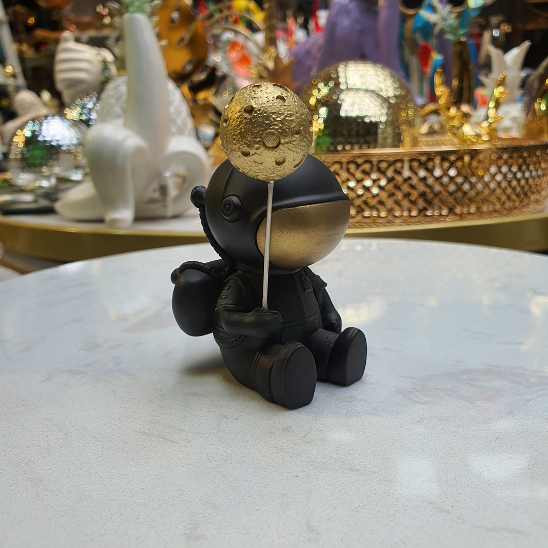 Astronauta Sentado Negro con dorado CASONA DECO