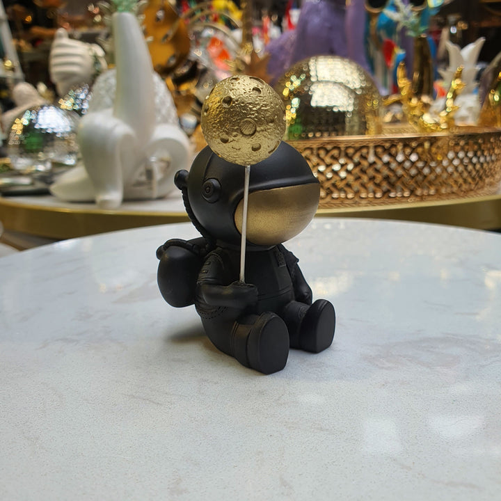 Astronauta Sentado Negro con dorado CASONA DECO
