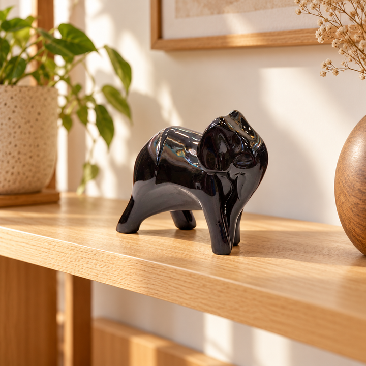 Elefante G-541C Negro Mini en repisa de madera