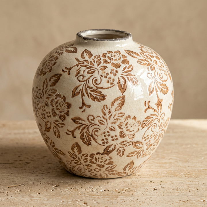 Jarrón globo de cerámica crema con floral café
