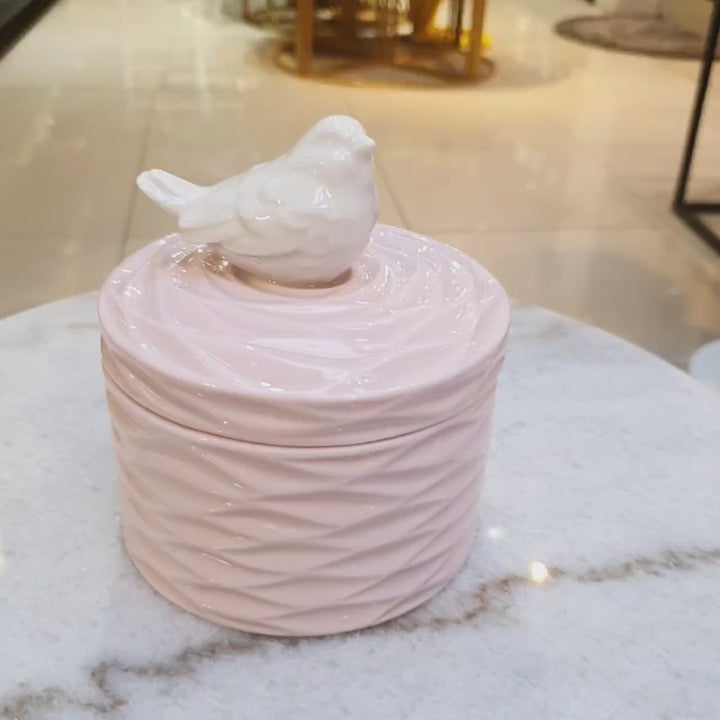 Contenedor de pajarito color rosado