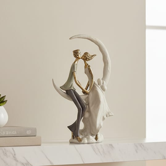 Pareja sentanda en la Luna CASONA DECO decoracion